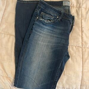 Distressed women’s Buckle straight leg jeans